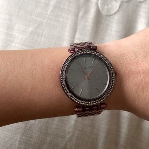Woman’s Michael Kors Watch in grape purple